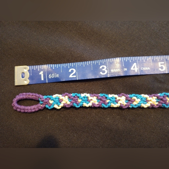 Friendship bracelet 10 inches long. Actual braid reaches 7 inches. Waxed cotton. - Picture 2 of 5